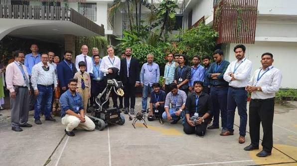 The BRACU Dichari team and guests with the rescue rover and drone